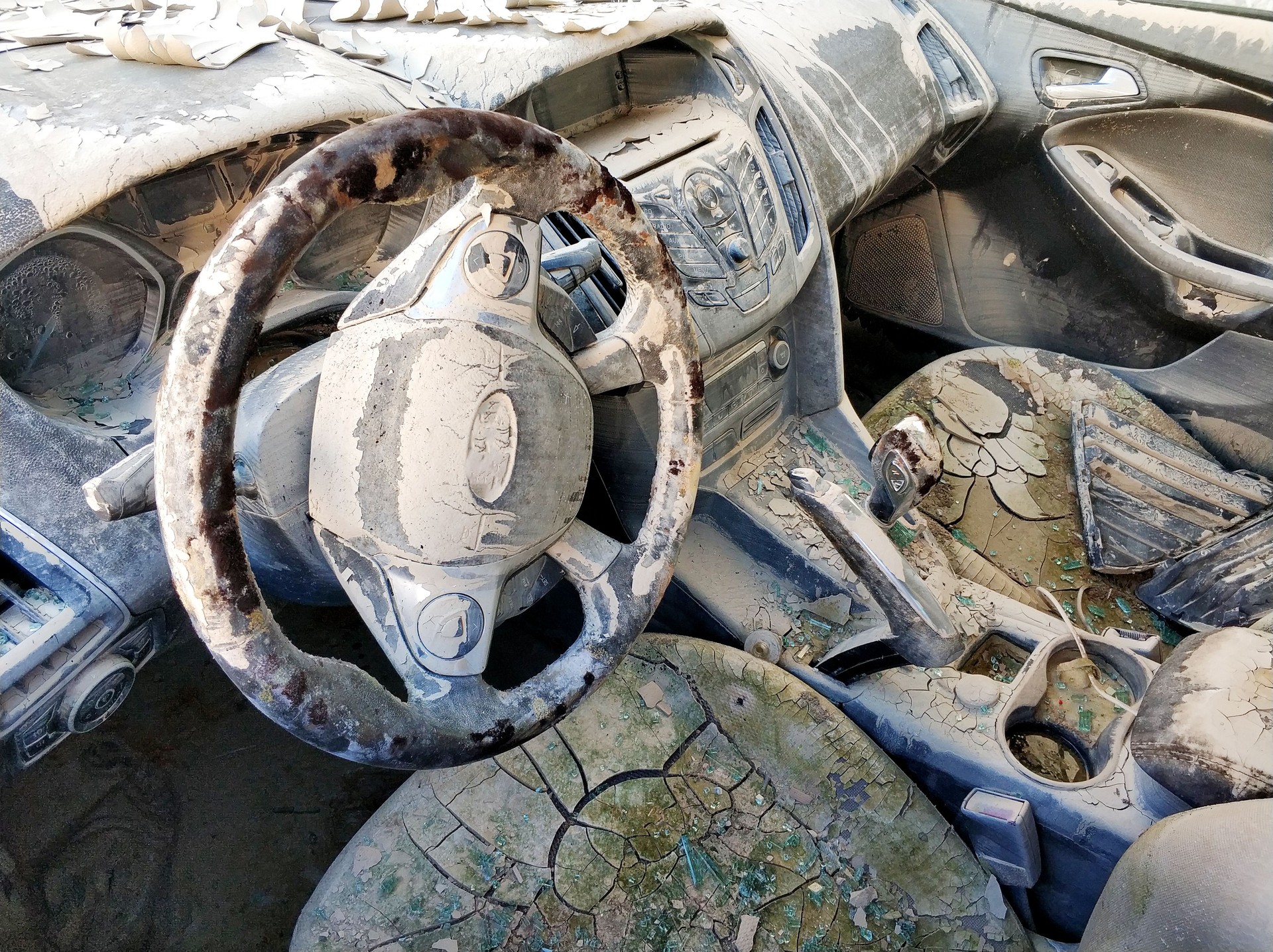 Dirty damaged car interior after flood or heavy rain